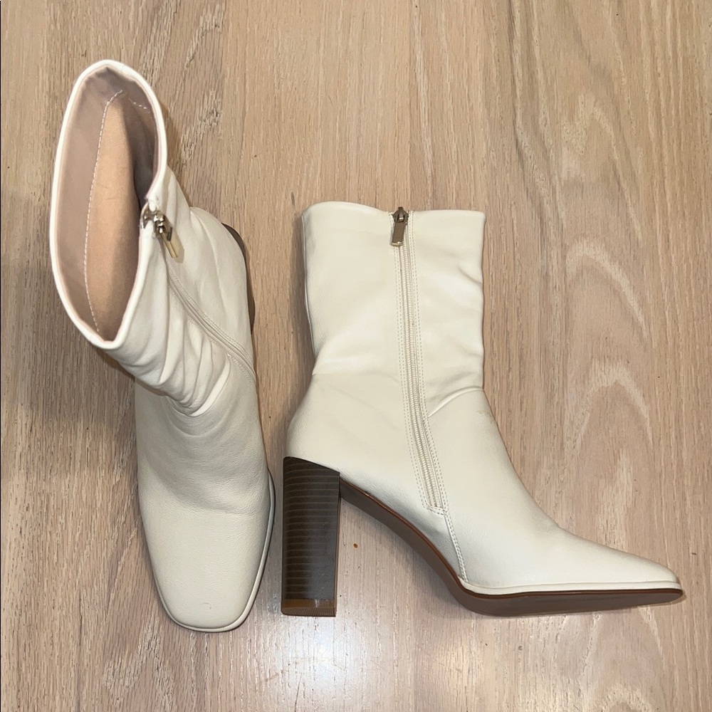 Heeled white faux leather boots